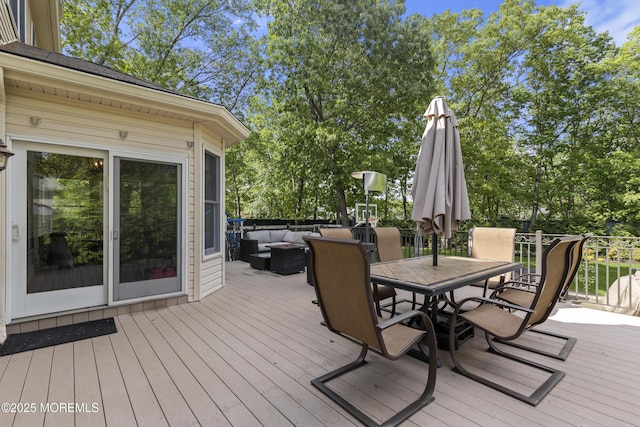 821 Woodland Dr, Lakewood, NJ 08701 - wooden terrace with outdoor lounge area and outdoor dining space