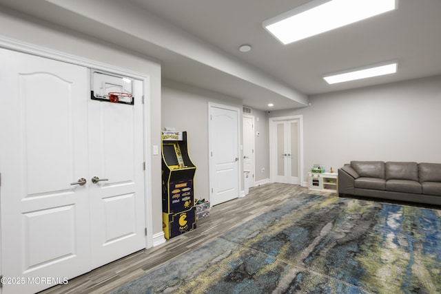 821 Woodland Dr, Lakewood, NJ 08701 - living area featuring wood finished floors, baseboards, and recessed lighting