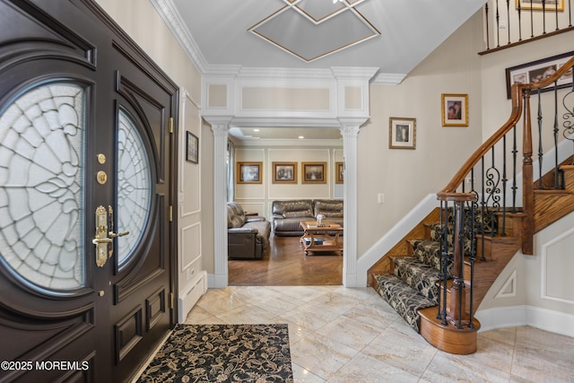 821 Woodland Dr, Lakewood, NJ 08701 - entrance foyer featuring ornate columns, crown molding, stairs, and light marble finish floors