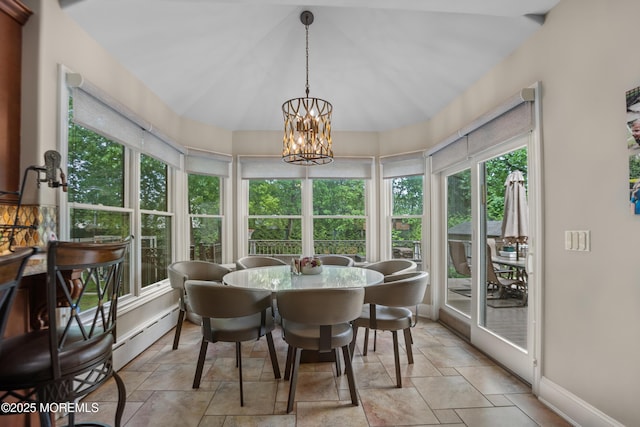821 Woodland Dr, Lakewood, NJ 08701 - sunroom / solarium with a chandelier, stone finish floors, a baseboard radiator, and baseboards