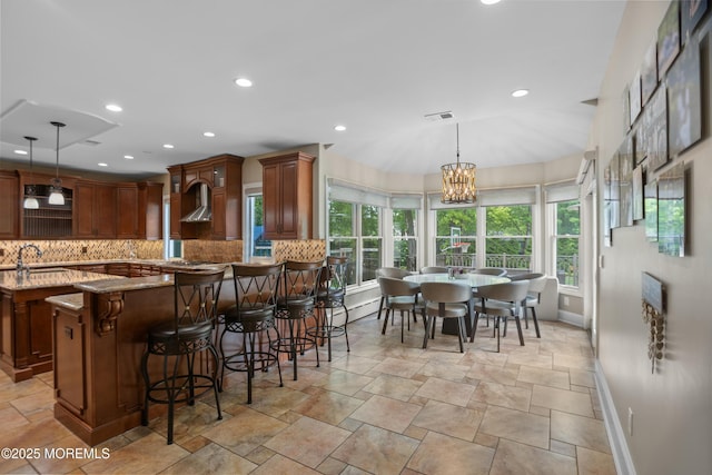 821 Woodland Dr, Lakewood, NJ 08701 - kitchen with baseboards, light stone counters, tasteful backsplash, healthy amount of natural light, and recessed lighting