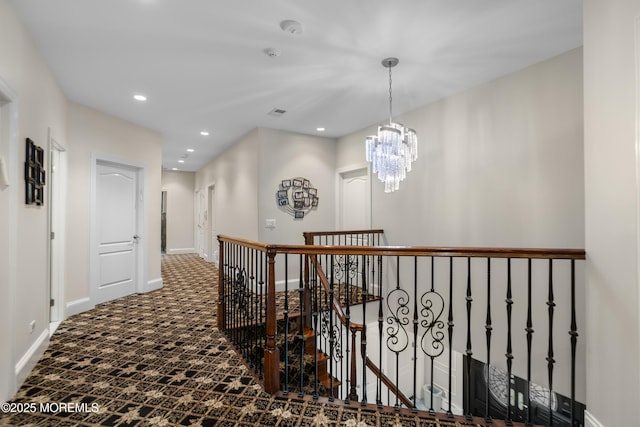 821 Woodland Dr, Lakewood, NJ 08701 - hallway featuring an upstairs landing, baseboards, a chandelier, recessed lighting, and carpet