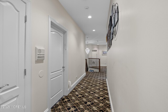 821 Woodland Dr, Lakewood, NJ 08701 - hallway with baseboards, recessed lighting, an upstairs landing, and tile patterned floors