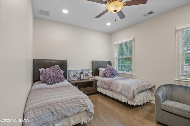 821 Woodland Dr, Lakewood, NJ 08701 - bedroom with multiple windows, wood finished floors, recessed lighting, and a ceiling fan