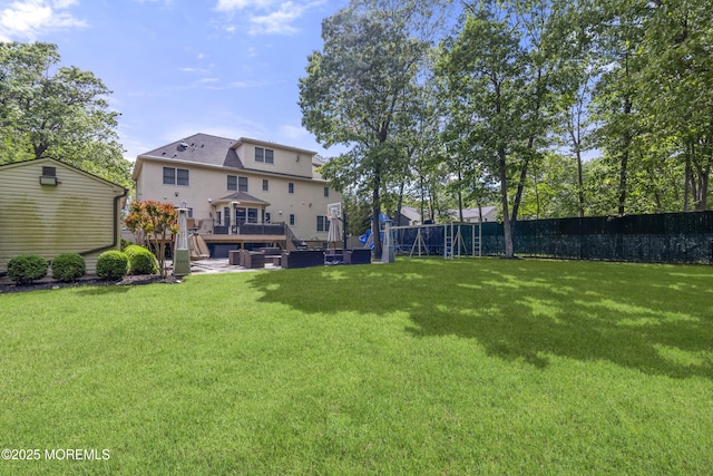 821 Woodland Dr, Lakewood, NJ 08701 - view of yard with a deck