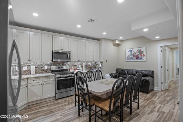 821 Woodland Dr, Lakewood, NJ 08701 - dining space featuring light wood-style floors, recessed lighting, and baseboards