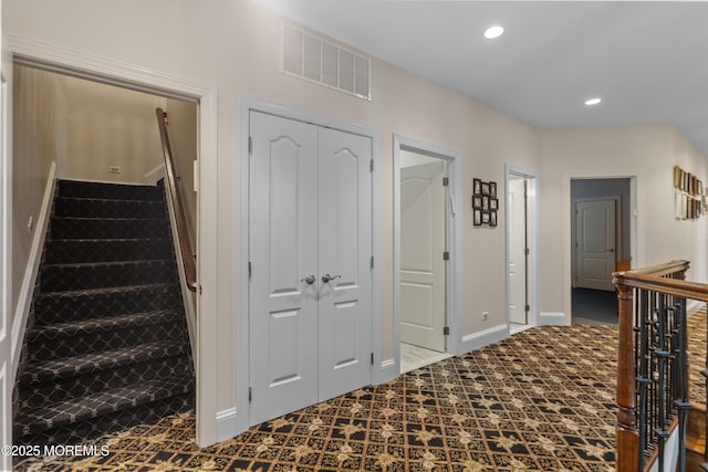 821 Woodland Dr, Lakewood, NJ 08701 - hall featuring recessed lighting, baseboards, stairway, and carpet floors