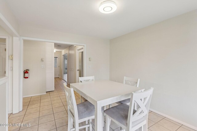 1164B Argyll Cir, Lakewood, NJ 08701 - dining room with light tile patterned floors and baseboards