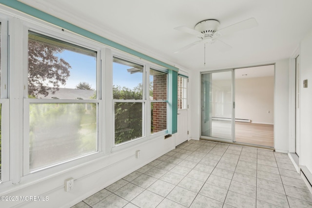 1164B Argyll Cir, Lakewood, NJ 08701 - unfurnished sunroom featuring a baseboard radiator, plenty of natural light, and tile patterned flooring