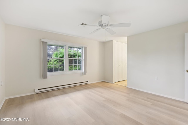 1164B Argyll Cir, Lakewood, NJ 08701 - empty room with a baseboard heating unit, light wood-style flooring, and ceiling fan