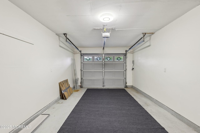 1164B Argyll Cir, Lakewood, NJ 08701 - garage featuring a garage door opener and baseboards