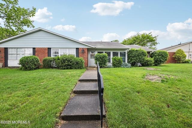 1164B Argyll Cir, Lakewood, NJ 08701 - ranch-style house with a front yard and brick siding