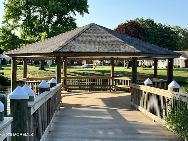 1164B Argyll Cir, Lakewood, NJ 08701 - dock with a gazebo, a lawn, and a wooden deck