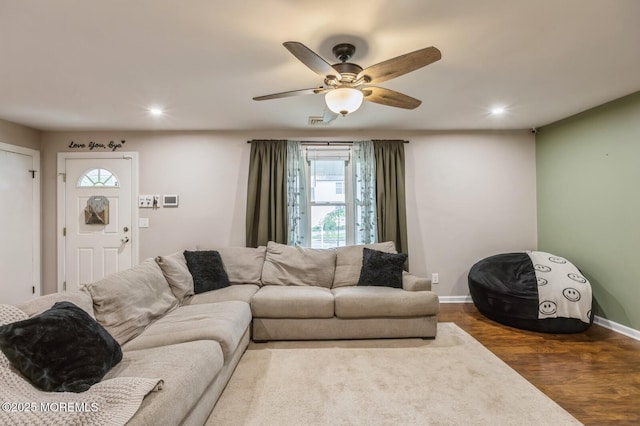 living area with baseboards, dark wood-style floors, recessed lighting, and a ceiling fan