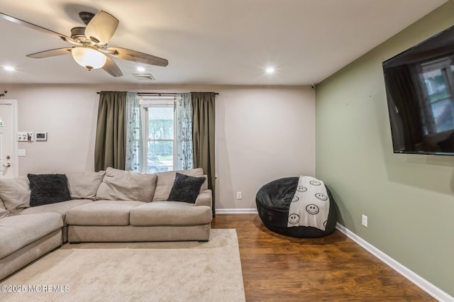 living room with wood finished floors, recessed lighting, ceiling fan, and baseboards