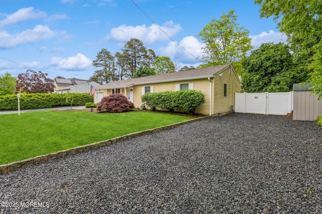 view of front of property with a gate