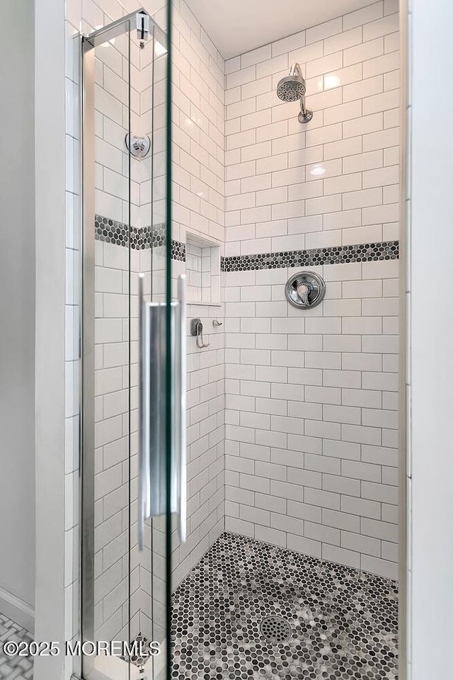 bathroom featuring a stall shower