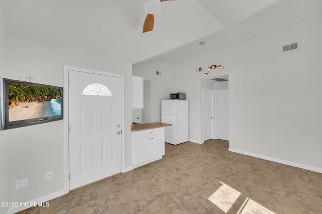 433 Bayside Ter Unit 1, Seaside Heights, NJ 08751 - entryway featuring ceiling fan, lofted ceiling, and baseboards