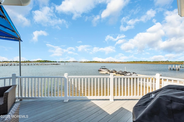 433 Bayside Ter Unit 1, Seaside Heights, NJ 08751 - deck featuring a water view and a grill