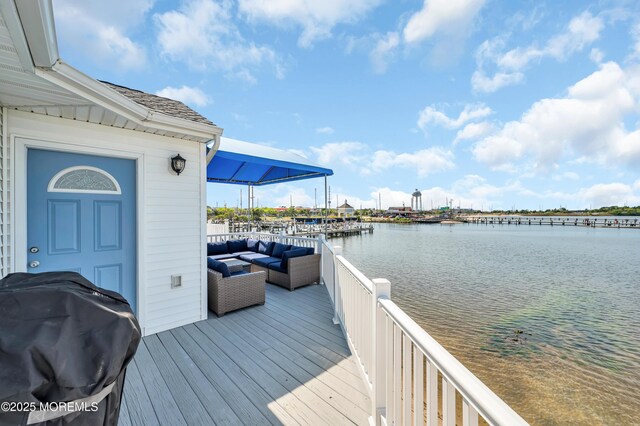 433 Bayside Ter Unit 1, Seaside Heights, NJ 08751 - wooden terrace featuring an outdoor hangout area, a water view, and a grill