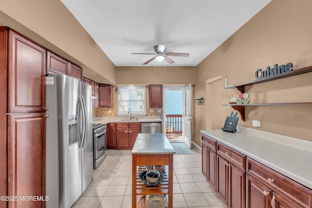 26 Morningside Ave, Keansburg, NJ 07734 - kitchen with appliances with stainless steel finishes, open shelves, ceiling fan, light countertops, and a sink