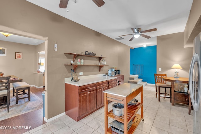 26 Morningside Ave, Keansburg, NJ 07734 - kitchen with a ceiling fan, open shelves, light countertops, baseboards, and light tile patterned floors