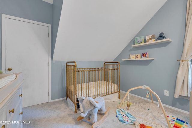 26 Morningside Ave, Keansburg, NJ 07734 - bedroom with a crib, light carpet, vaulted ceiling, and baseboards