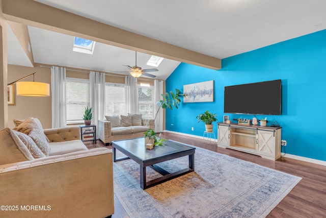 26 Morningside Ave, Keansburg, NJ 07734 - living room featuring a skylight, baseboards, and wood finished floors