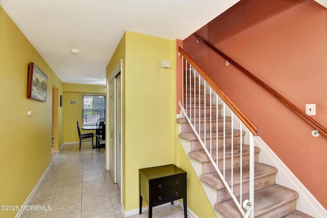 5 Isabella Dr, Lakewood, NJ 08701 - staircase with tile patterned floors and baseboards