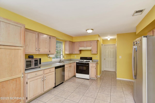 5 Isabella Dr, Lakewood, NJ 08701 - kitchen with appliances with stainless steel finishes, a sink, under cabinet range hood, and light brown cabinets
