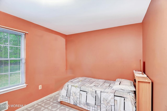 5 Isabella Dr, Lakewood, NJ 08701 - bedroom with baseboards and tile patterned floors