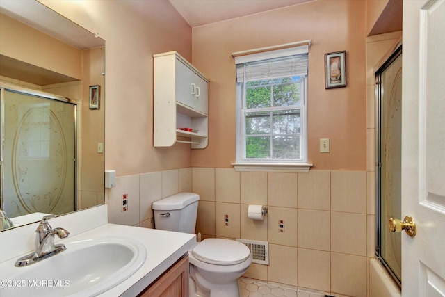5 Isabella Dr, Lakewood, NJ 08701 - full bathroom with tile walls, vanity, tile patterned flooring, wainscoting, and toilet