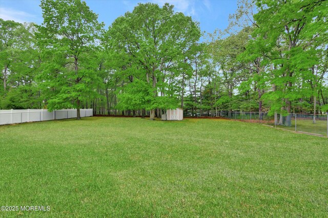 5 Isabella Dr, Lakewood, NJ 08701 - view of yard featuring a storage shed and an outbuilding