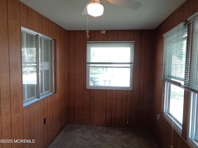 10A Molly Pitcher Blvd, Whiting, NJ 08759 - spare room with plenty of natural light, carpet flooring, ceiling fan, and wood walls