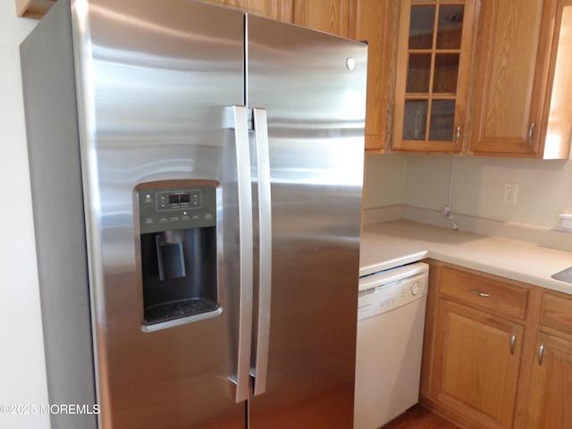 10A Molly Pitcher Blvd, Whiting, NJ 08759 - kitchen featuring stainless steel fridge, white dishwasher, glass insert cabinets, and light countertops