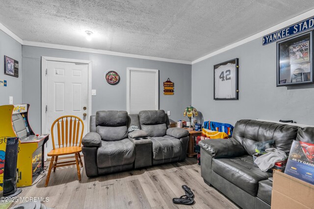 312 Dogwood Dr, Brick, NJ 08723 - living room with a textured ceiling, wood finished floors, and crown molding