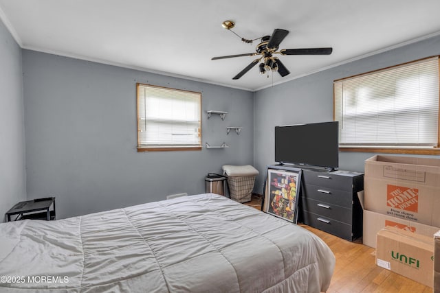 312 Dogwood Dr, Brick, NJ 08723 - bedroom featuring wood finished floors, ornamental molding, and ceiling fan