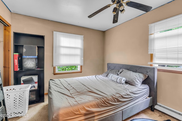 312 Dogwood Dr, Brick, NJ 08723 - carpeted bedroom with baseboard heating, baseboards, and a ceiling fan