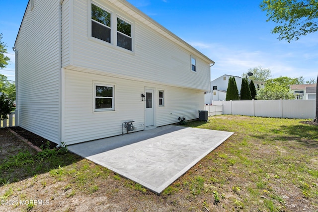 back of house featuring a patio area and central AC