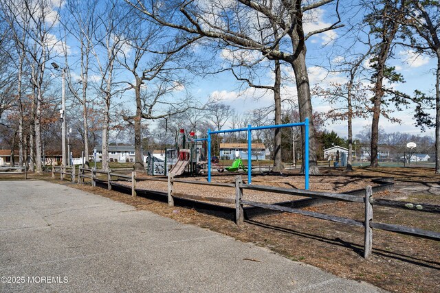 community jungle gym with fence