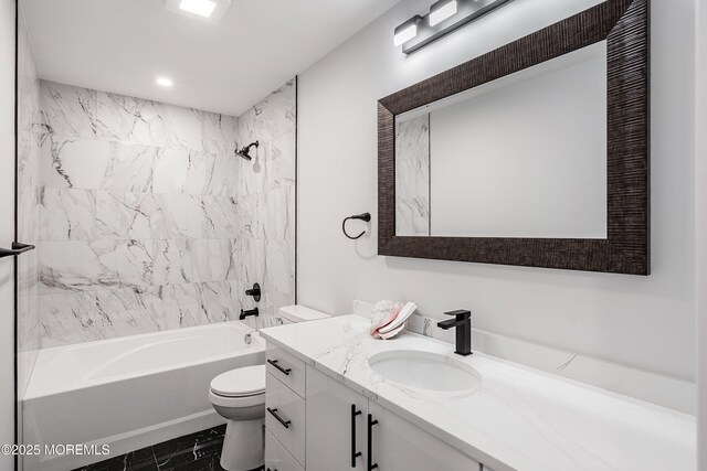 bathroom featuring toilet, marble look tile flooring, vanity, shower / bath combination, and recessed lighting