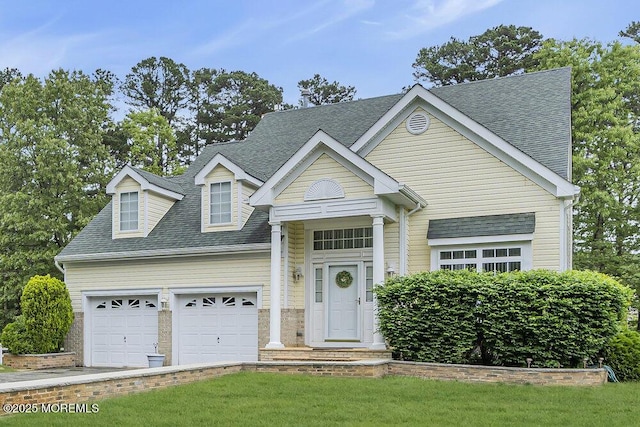 303 Diamond Rd, Jackson, NJ 08527 - view of front of home with a shingled roof, a garage, and a front yard