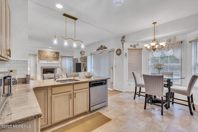 303 Diamond Rd, Jackson, NJ 08527 - kitchen featuring dishwasher, a sink, a chandelier, a peninsula, and light stone countertops