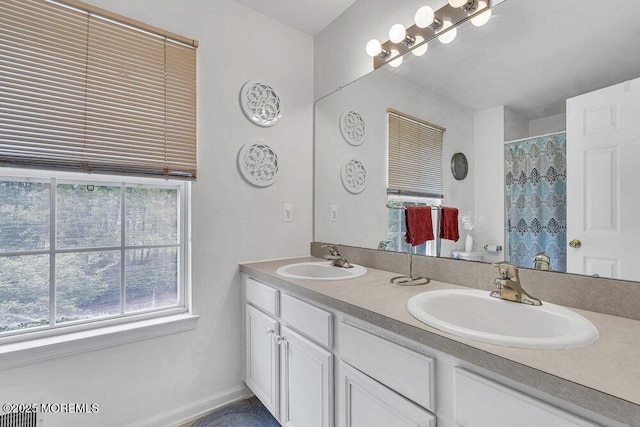 303 Diamond Rd, Jackson, NJ 08527 - bathroom featuring double vanity and curtained shower