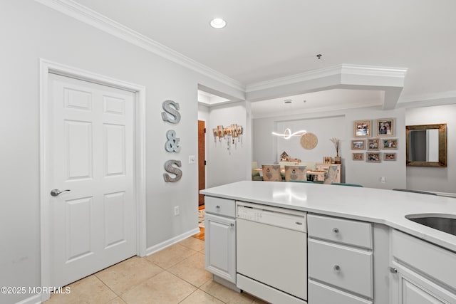 kitchen with white dishwasher, ornamental molding, light tile patterned floors, light countertops, and white cabinetry