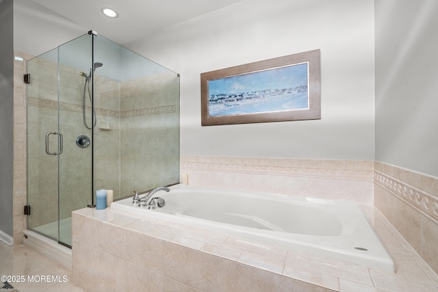 full bathroom with a shower stall, a garden tub, recessed lighting, and tile patterned floors