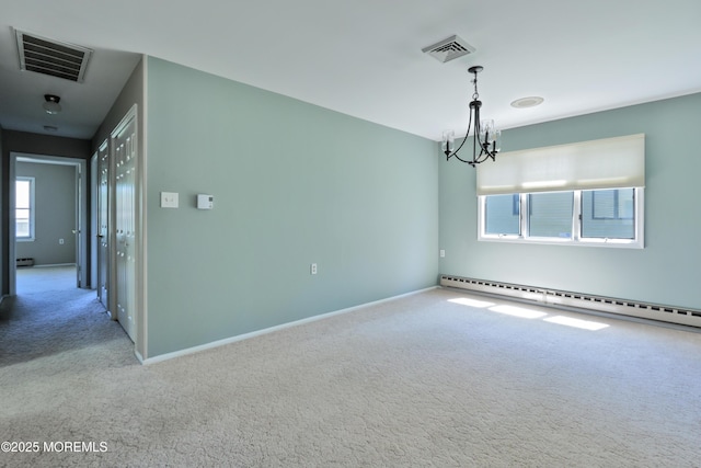 113 Ash Rd Unit 8, Manahawkin, NJ 08050 - carpeted empty room featuring a chandelier, a baseboard radiator, baseboards, and a baseboard heating unit