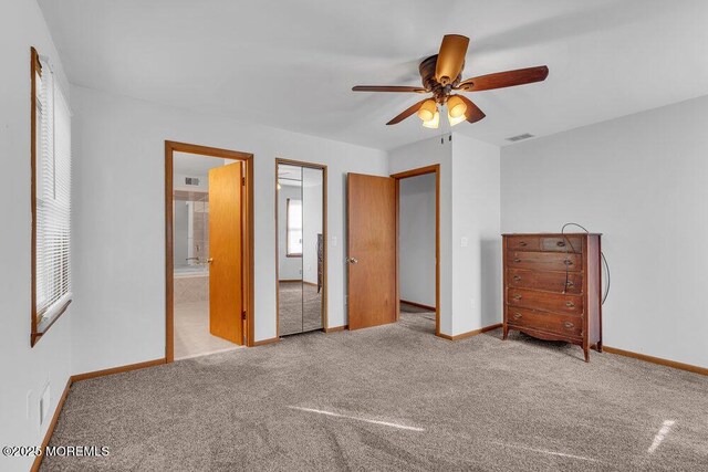 1430 Forest Ave, Brick, NJ 08724 - unfurnished bedroom with carpet floors, baseboards, connected bathroom, and ceiling fan