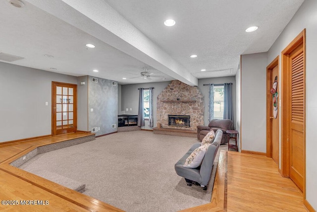 1430 Forest Ave, Brick, NJ 08724 - living area with a fireplace, recessed lighting, baseboards, ceiling fan, and healthy amount of natural light