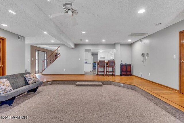 1430 Forest Ave, Brick, NJ 08724 - carpeted living area with recessed lighting, a textured ceiling, stairs, baseboards, and a ceiling fan